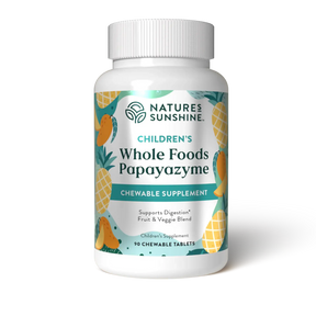 A white plastic bottle of Nature's Sunshine Children's Whole Foods Papayazyme chewable supplement, featuring a colorful label with illustrations of pineapples and mangoes on a white background.