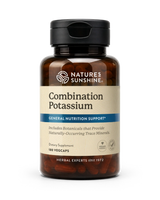 A bottle of Nature's Sunshine Combination Potassium dietary supplement, featuring an amber brown bottle, black cap, and a beige label with blue accents, containing 180 vegcaps.