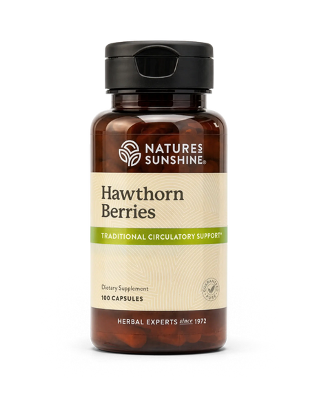 A bottle of Nature's Sunshine Hawthorn Berries dietary supplement, featuring an amber brown bottle, black cap, and a beige label with green accents, set against a plain white background.
