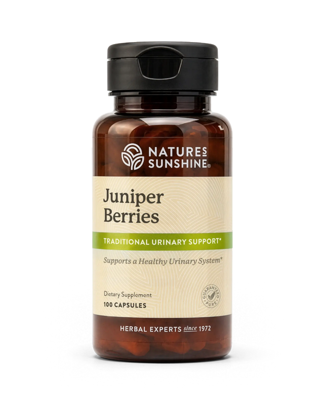 A bottle of Nature's Sunshine Juniper Berries dietary supplement, featuring an amber brown bottle, a black flip-top cap, and a beige label with green accents, set against a plain white background.