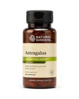 A bottle of Natures Sunshine Astragalus dietary supplement, featuring an amber glass bottle with a black cap and a beige label with green accents, on a white background.