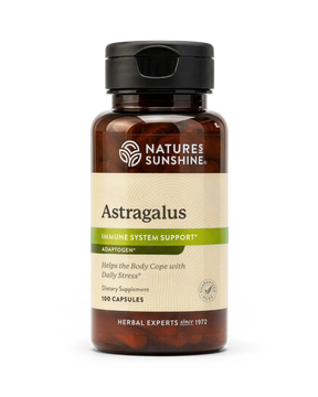 A bottle of Natures Sunshine Astragalus dietary supplement, featuring an amber glass bottle with a black cap and a beige label with green accents, on a white background.