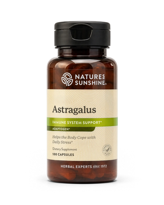 A bottle of Natures Sunshine Astragalus dietary supplement, featuring an amber glass bottle with a black cap and a beige label with green accents, on a white background.