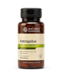 A bottle of Natures Sunshine Astragalus dietary supplement, featuring an amber glass bottle with a black cap and a beige label with green accents, on a white background.