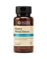 A bottle of Nature's Sunshine Heavy Metal Detox dietary supplement, containing 90 vegcaps, shown on a clean white background.