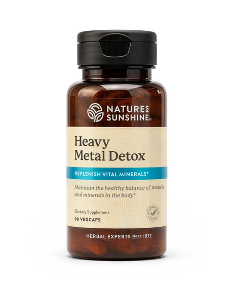 A bottle of Nature's Sunshine Heavy Metal Detox dietary supplement, containing 90 vegcaps, shown on a clean white background.