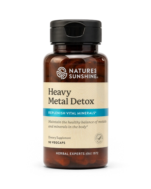A bottle of Nature's Sunshine Heavy Metal Detox dietary supplement, containing 90 vegcaps, shown on a clean white background.