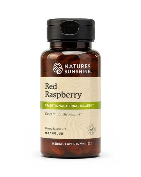 A bottle of Nature's Sunshine Red Raspberry dietary supplement with a black cap and amber-brown bottle, on a clean white background.