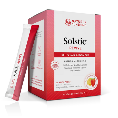A box of Nature's Sunshine Solstic Revive nutritional drink mix with a single stick pack leaning against the front left side, shown on a clean white background.