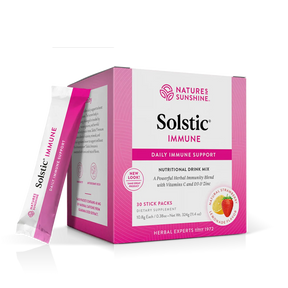 Nature's Sunshine Solstic Immune Daily Immune Support box in pink and white packaging, with one single stick pack standing in front on a clean white background.