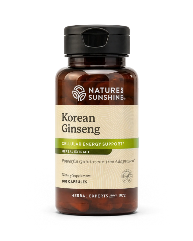 A bottle of Natures Sunshine Korean Ginseng dietary supplement, featuring an amber glass bottle with a black cap and a cream-colored label with green accents.