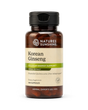 A bottle of Natures Sunshine Korean Ginseng dietary supplement, featuring an amber glass bottle with a black cap and a cream-colored label with green accents.