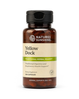 A bottle of Nature's Sunshine Yellow Dock dietary supplement with a black cap and a beige label, shown on a plain white background.