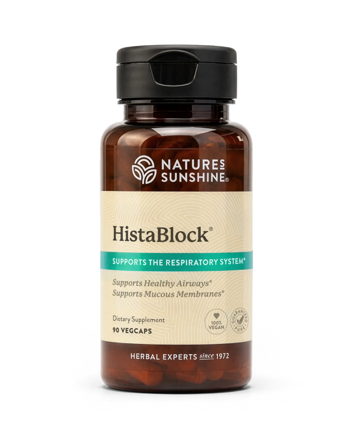 A bottle of Nature's Sunshine HistaBlock dietary supplement with a black cap and amber-brown bottle, featuring a beige and teal label, on a white background.