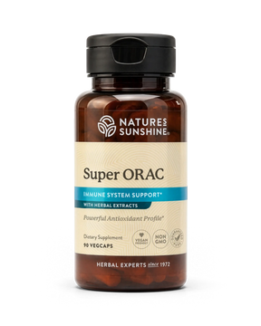 A bottle of Nature's Sunshine Super ORAC dietary supplement with amber glass, a black cap, and a beige label with blue accents, shown on a white background.