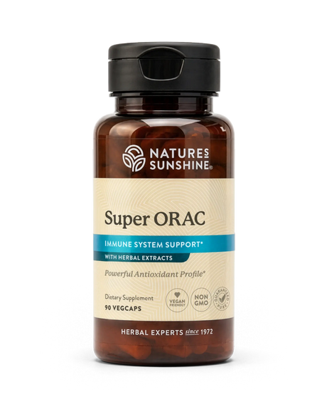 A bottle of Nature's Sunshine Super ORAC dietary supplement with amber glass, a black cap, and a beige label with blue accents, shown on a white background.