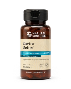 A bottle of Nature's Sunshine Enviro-Detox dietary supplement, featuring an amber brown bottle, beige label, and black cap, set against a plain white background.