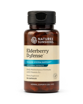 A bottle of Nature's Sunshine Elderberry D3fense dietary supplement, featuring an amber brown bottle, beige label, and black cap, shown on a clean white background.