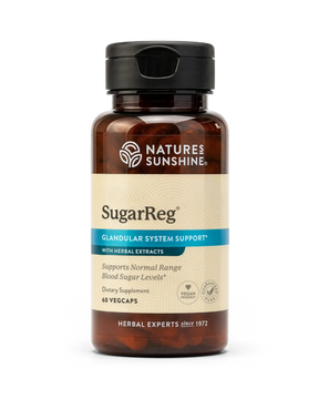 A bottle of Nature's Sunshine SugarReg Glandular System Support dietary supplement, featuring an amber brown bottle, black cap, and beige label with blue accents.