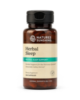 A bottle of Nature's Sunshine Herbal Sleep dietary supplement with a black cap and amber brown bottle, on a white background.