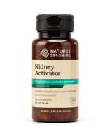 A bottle of Nature's Sunshine Kidney Activator dietary supplement, featuring an amber brown bottle, beige label, and black cap, set against a plain white background.