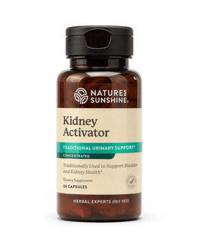 A bottle of Nature's Sunshine Kidney Activator dietary supplement, featuring an amber brown bottle, beige label, and black cap, set against a plain white background.