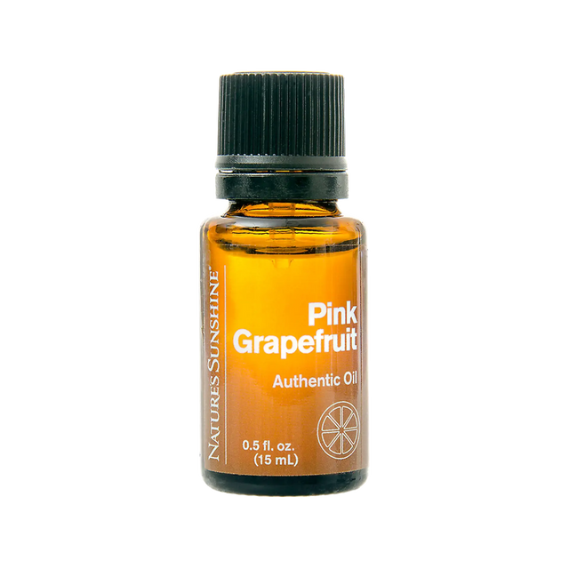 A 15 mL amber glass bottle of Natures Sunshine Pink Grapefruit Essential Oil with a black ribbed cap, shown on a solid white background.