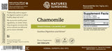 The back label of a Nature's Sunshine Chamomile Traditional Calming Aid dietary supplement, showing product details, usage instructions, and a supplement facts panel on a beige background.