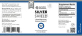 Silver Shield Liquid Dietary Supplement bottle label by Nature's Sunshine, featuring a dark blue background with white text, a silver shield logo, supplement facts, and a barcode.